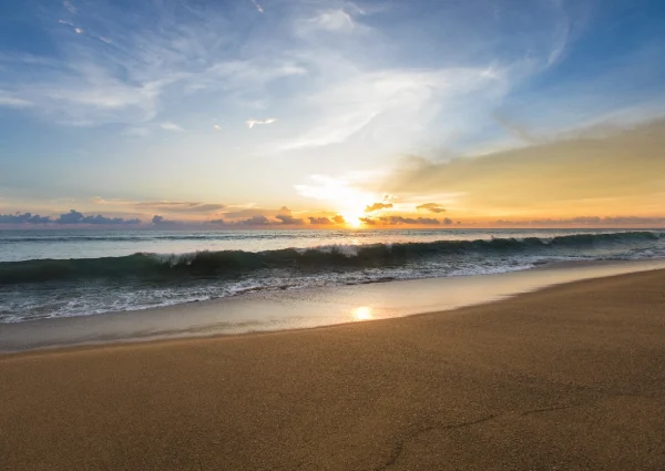 ocean waves crashing on sand